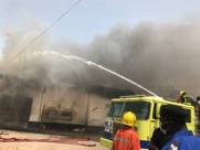 As a factory fire kills millions of items worth dalasi, an employee calls for help